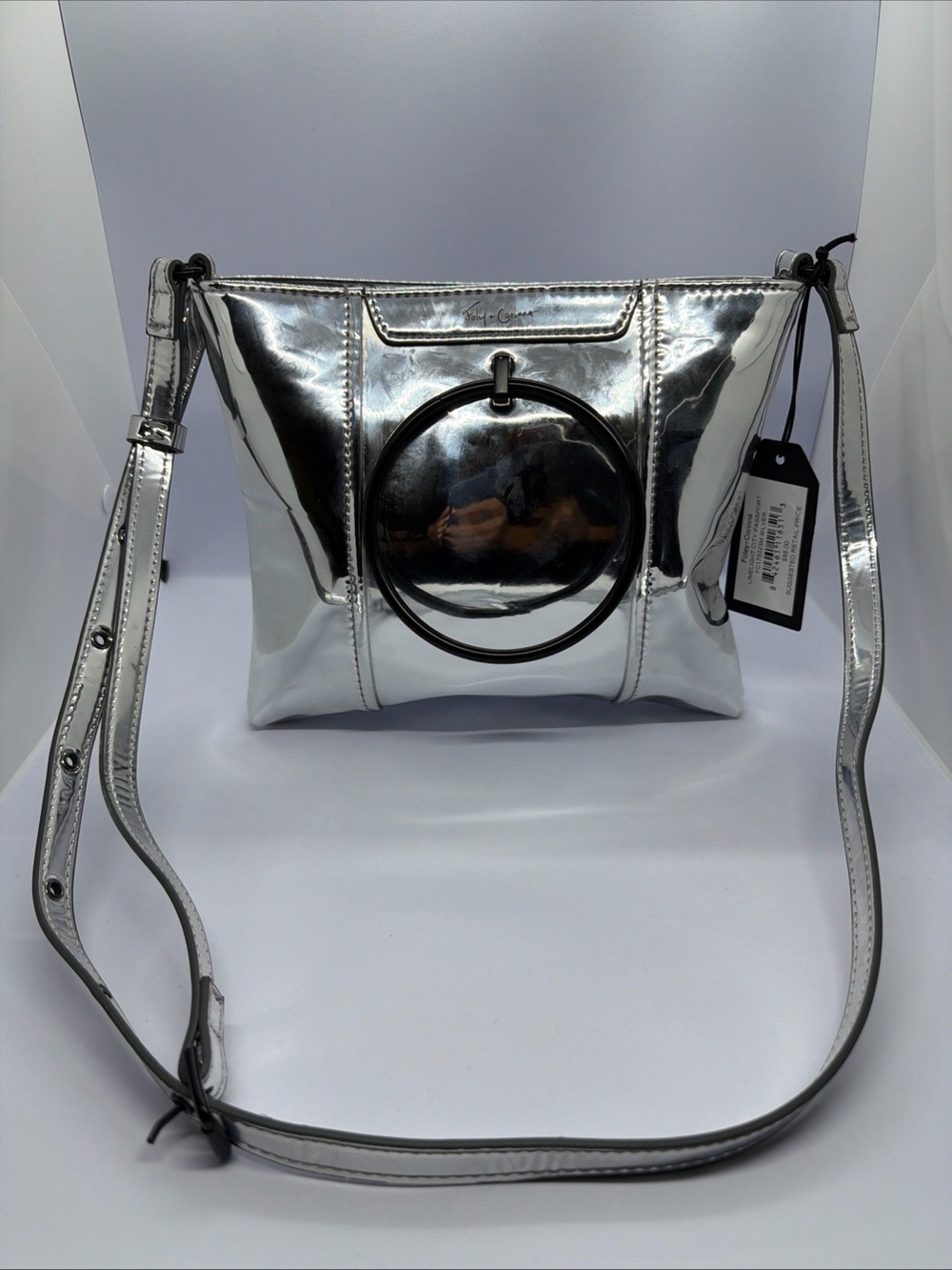 Foley + Corinna Metallic Silver Crossbody with Circular Ring Accent